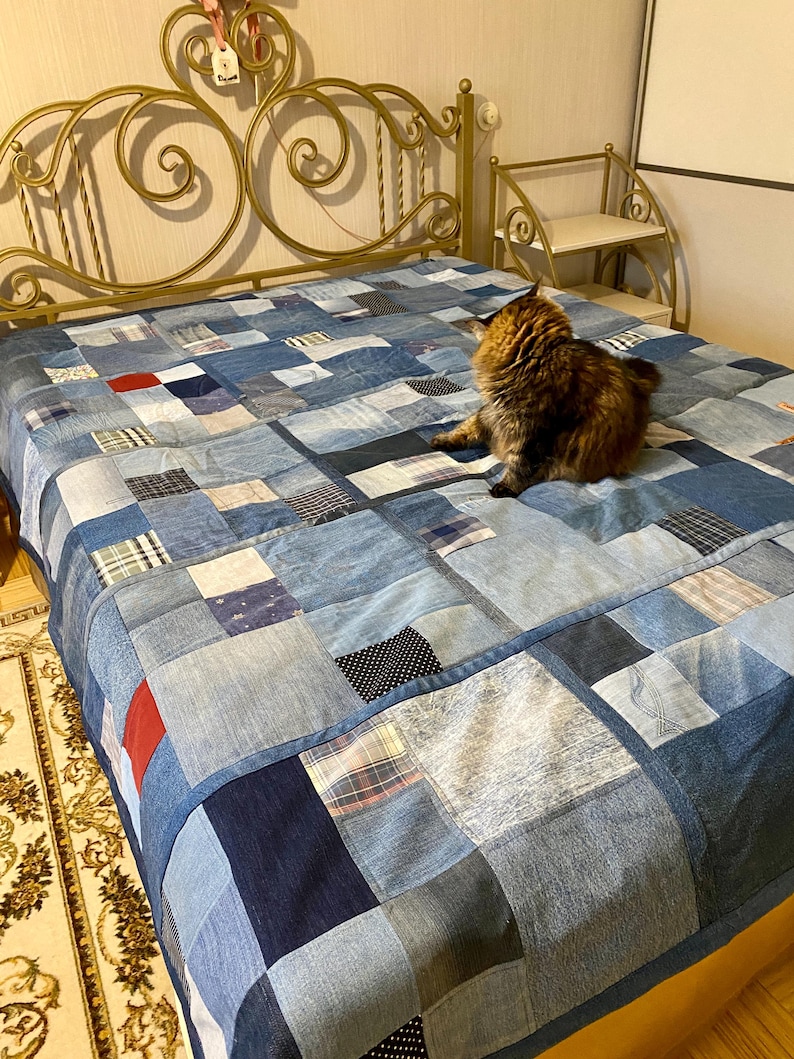 • Material: Made with high-quality, upcycled denim and soft cotton fabric for durability and comfort.
 • Design: A beautiful patchwork pattern featuring various shades of blue, accented by pops of color for a modern, rustic aesthetic.