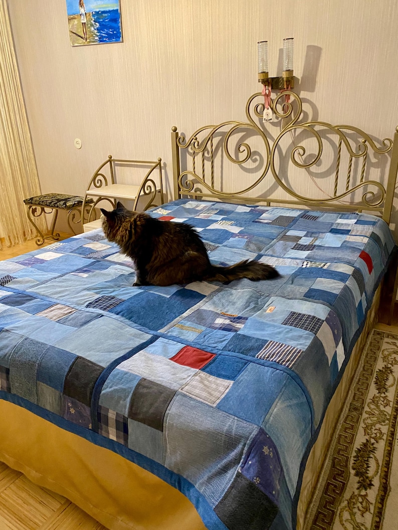 • Material: Made with high-quality, upcycled denim and soft cotton fabric for durability and comfort.
 • Design: A beautiful patchwork pattern featuring various shades of blue, accented by pops of color for a modern, rustic aesthetic.