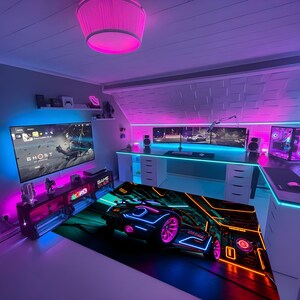 May include: A gaming setup with a neon theme. The room includes a large screen showing a video game, a desk with multiple monitors, and a gaming PC. A large mousepad with a neon car design is on the floor. The room is lit with pink and blue neon lights.