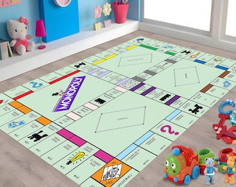 May include: A large Monopoly board game rug with colorful property spaces and game instructions. The rug is light green with a purple Monopoly logo. Toy train and alphabet blocks are in the foreground.