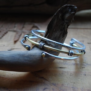 PEGASE zilveren en messing armbanden