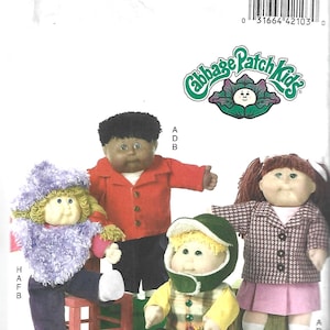 May include: A Butterick sewing pattern featuring Cabbage Patch Kids dolls. The dolls are dressed in various outfits, including a red jacket, a purple fuzzy sweater, and a houndstooth coat. The pattern includes the Cabbage Patch Kids logo.