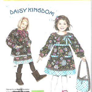 May include: Simplicity sewing pattern 2348, a Daisy Kingdom design for children's dresses and a bag. Sizes AA 2, 3, 4, and 5 are included. The dresses feature floral patterns and bows. The pattern is for dressmaking.