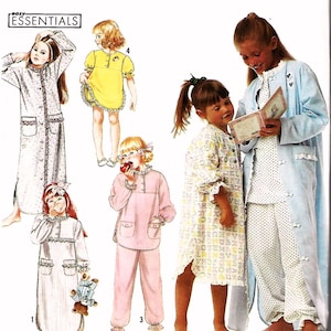 May include: Simplicity sewing pattern for girls' sleepwear. The pattern features various pajama styles, including nightgowns and pajama sets, with decorative details. The image includes illustrations of the finished garments and the "Essentials" label.