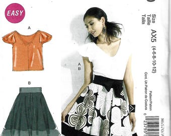 McCalls Pattern #6570 for Misses top and lined skirt. Sizes: 4-12.  Brand new paper pattern.  Uncut.