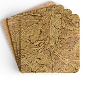 May include: Four square coasters with a detailed leaf pattern in shades of brown and gold. The coasters have a cork backing for heat resistance and to protect surfaces. The leaf design is intricate and covers the entire surface of the coasters.