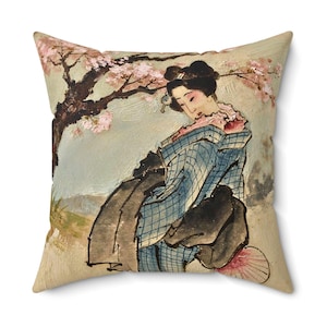 May include: A set of three ceramic mugs with a speckled, matte finish. The mugs are in shades of cream, gray, and black. Each mug has a simple, modern design, perfect for coffee or tea. The mugs are stacked on top of each other.