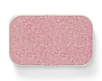 Fiambrera Bento vintage rosa con estampado floral, recipiente reutilizable para alimentos.