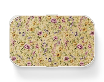 Fiambrera Bento con estampado floral vintage, incluye utensilios y estampado de rosas amarillas estilo cottagecore.