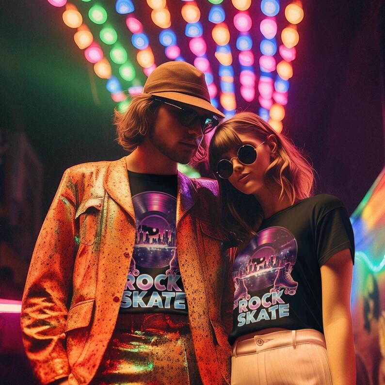 May include: A couple wearing matching black t-shirts with a graphic of a vinyl record and the words "ROCK SKATE". The man wears a brown hat and orange jacket. The woman wears sunglasses. The background has colorful lights.