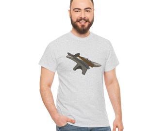 May include: A gray t-shirt with a graphic of a metal anvil and a hammer on it.