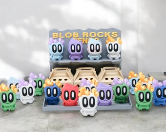Mystery Pet Rock - Objets de collection imprimés en 3D avec support, chaque boîte est une surprise amusante ! (Couleur aléatoire, couleur phosphorescente ou design unique