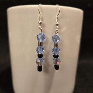 Blue, black and purple glass bead dangle earrings