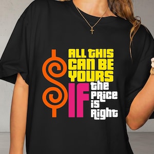 Puede incluir: Camiseta negra con un gráfico colorido. El diseño presenta un gran signo de dólar naranja y amarillo, el texto "ALL THIS CAN BE YOURS IF the PRICE is Right" en amarillo, rosa y blanco.