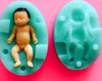 Baby mold, silicone rubber mold  baby size 4 by 1.5cm The precious baby is made of polymer clay by my dear client  etsy.com/shop/ivydollarts