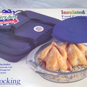May include: A boxed 3-piece food carrier set by Anchor Hocking. The set includes an oval casserole, plastic lid, and an insulated fabric carrier. The carrier is navy blue, and the casserole contains cooked chicken.