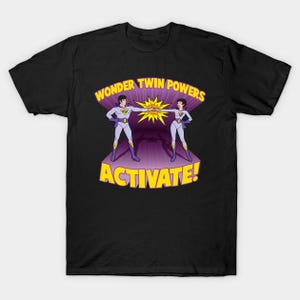May include: Black t-shirt with a graphic of two cartoon figures in purple and yellow costumes with the text "Wonder Twin Powers Activate!"