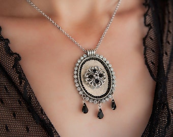 Statement silver pendant necklace with black crystals