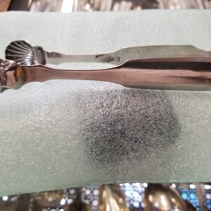 Coin silver sugar tongs  Samuel Hildeburn- Philadelphia, Pa.