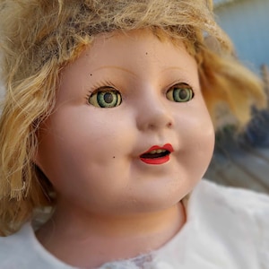 Antique Shirley Temple Composition Project Doll. 23&quot; tall, in very good condition.