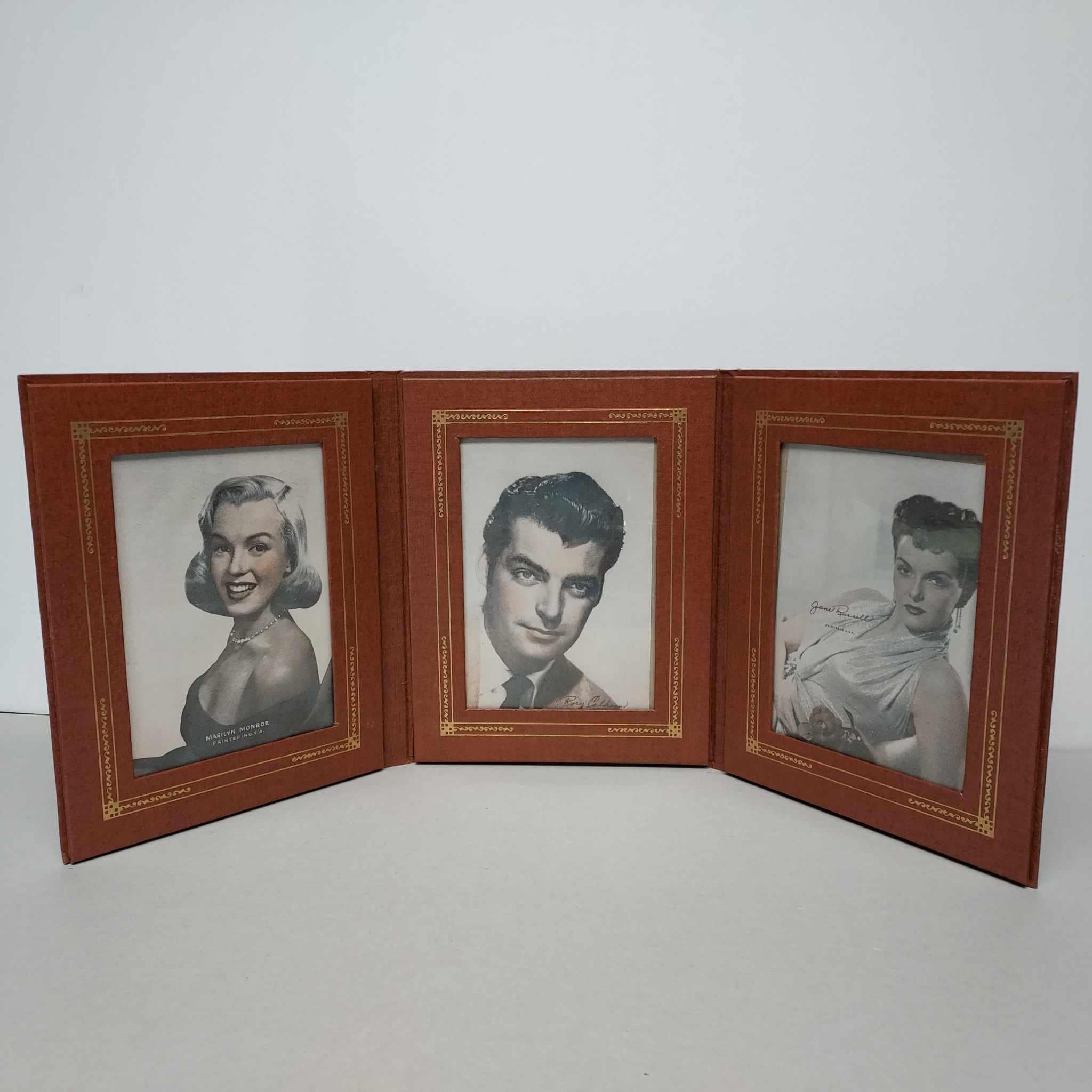 Vintage Tri fold Leather look frame with Movie Star photos: Marilyn Monroe. Rory Calhoun, Jane Russell