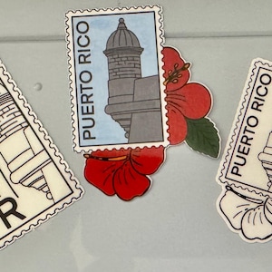 May include: Three rectangular magnets with a postage stamp design featuring a Puerto Rican fort and the text "PUERTO RICO". One magnet has a flag design with "PR". Red hibiscus flowers are also present.