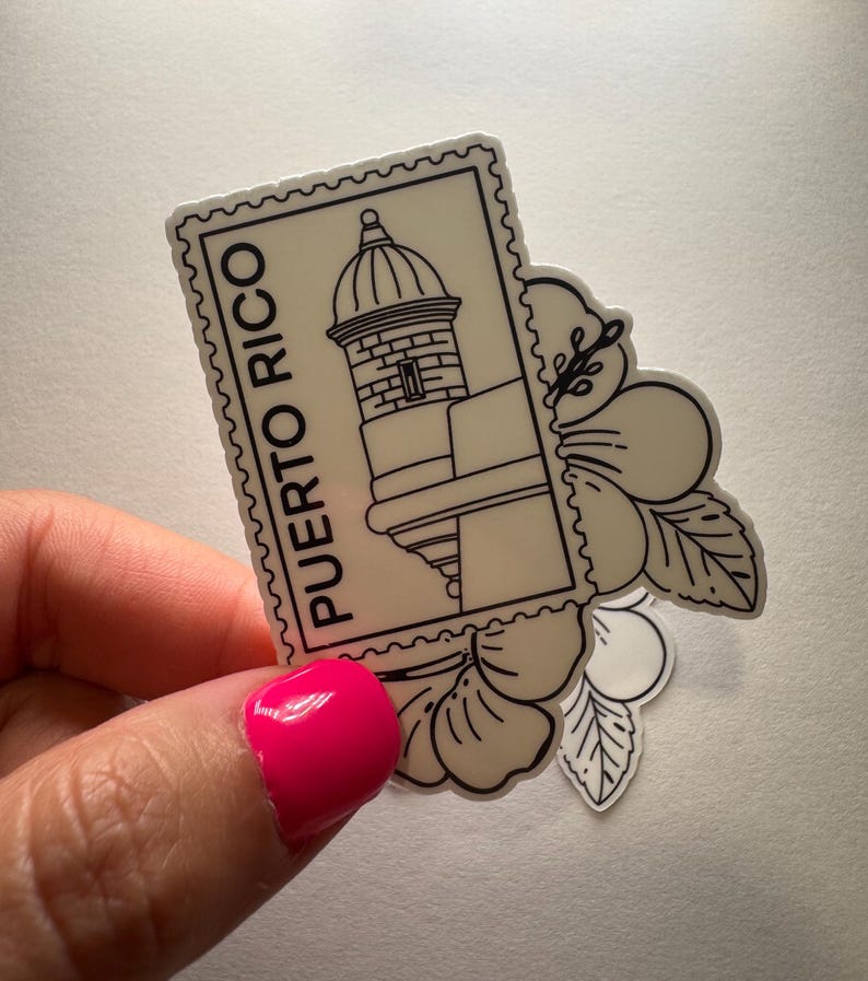May include: A sticker featuring a black and white illustration of a Puerto Rican landmark, resembling a postage stamp. The stamp is accompanied by a floral design. The words "PUERTO RICO" are printed on the stamp.