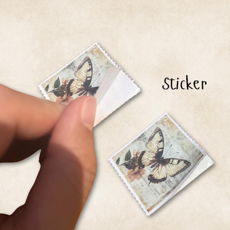 May include: Two square stickers with a butterfly design. The stickers have a vintage aesthetic with a butterfly and floral elements. The word "Sticker" is printed in black. One sticker's backing is being peeled away.