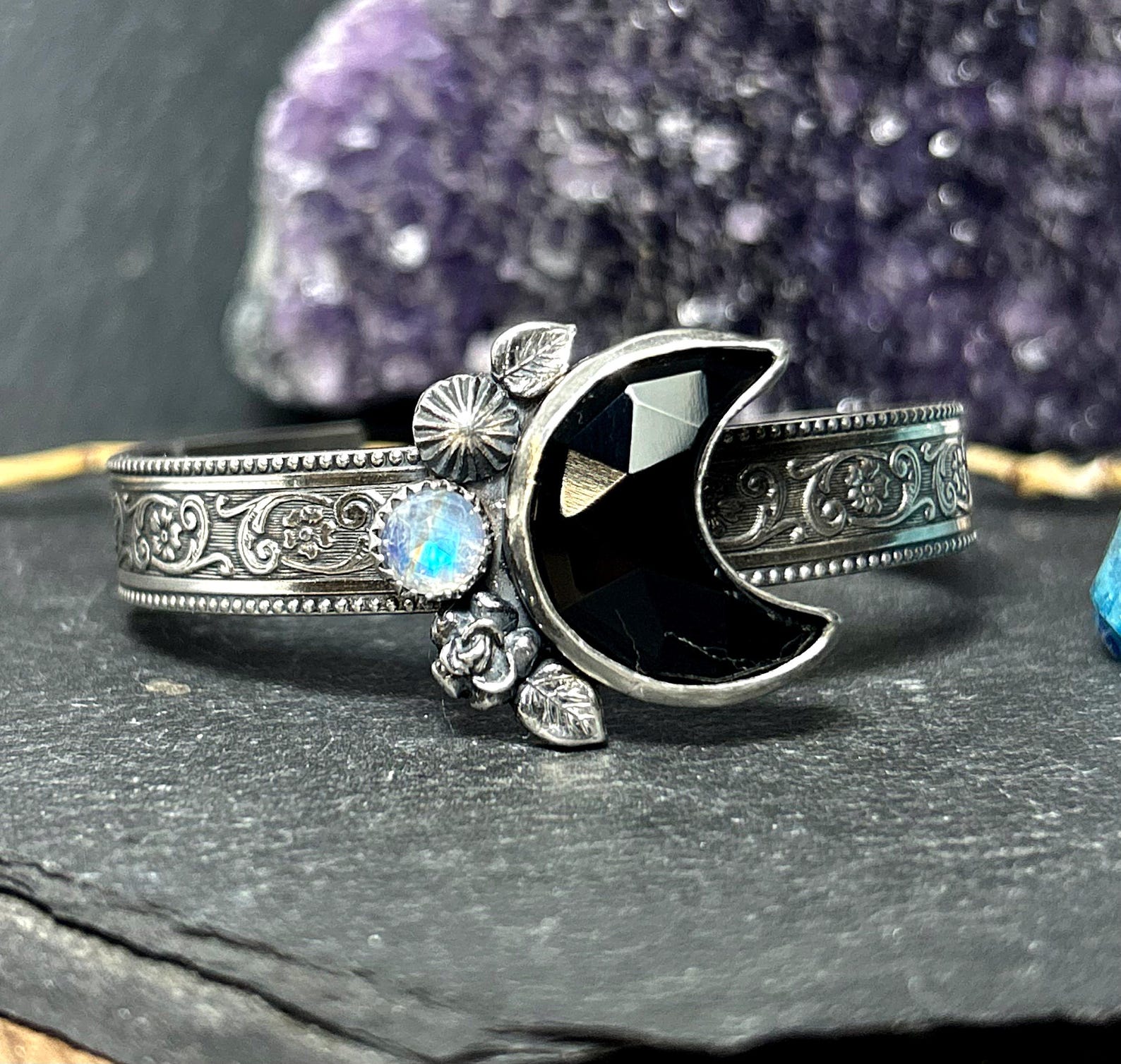 Crescent moon onyx and moonstone cuff with floral sterling silver band