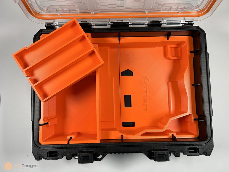 May include: An open orange and black hard plastic case with a removable orange tray with three compartments. The case has a black latch and a clear plastic lid.