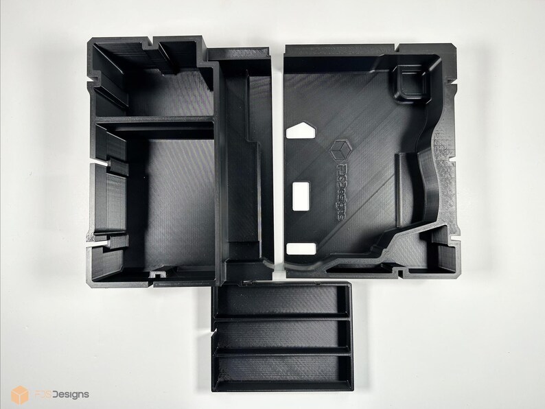 May include: Black plastic organizer with multiple compartments and a removable tray. The organizer has the word "Prototype" printed on the side.
