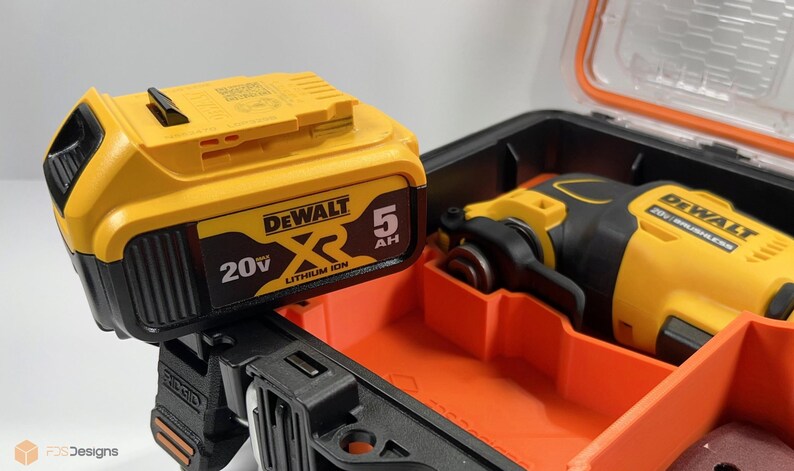 May include: A yellow and black DeWalt XR 20V 5Ah lithium-ion battery is shown next to a yellow and black DeWalt oscillating tool in a black and orange tool case.