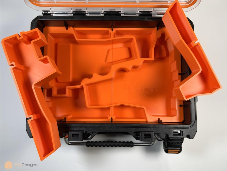 May include: An orange and black tool box with a removable foam insert. The insert has multiple compartments for organizing tools.