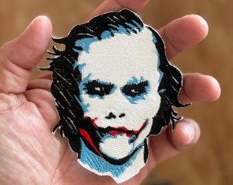 Écusson brodé visage Joker : pourquoi il est si sérieux d'appliquer le thermocollant