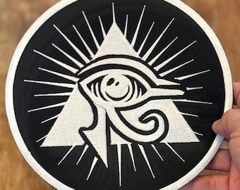 Parche bordado Ojo de Horus: símbolo del antiguo Egipto, termoadhesivo y cosible (20 cm)