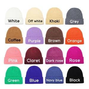May include: A collection of sixteen ribbed knit beanies in various colors, each labeled with its corresponding color name: White, Off white, Khaki, Grey, Coffee, Purple, Brown, Orange, Pink, Claret, Dark rose, Rose, Green, Blue, Navy blue, and Black.