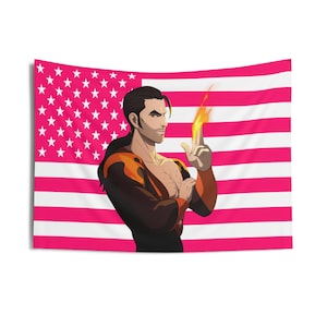May include: A tapestry featuring a stylized illustration of a person with dark hair and a muscular build, posing in front of a pink and white American flag. The person is holding up their hand with flames emanating from their fingers.