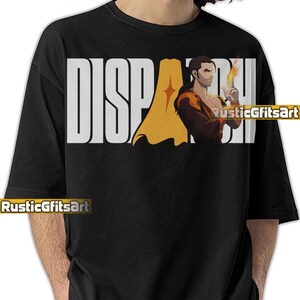 May include: Black crew neck t-shirt with the word "DISPATCH" in large white block letters. A graphic of a person with a yellow cape and a flame is on the shirt. The text "RusticGiftsArt" is also on the shirt.