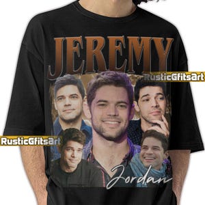 May include: Black t-shirt featuring a collage of images of a man, with the name "Jeremy" in large, brown, vintage-style lettering above the images. The name "Jordan" is written in cursive below the images. The text "RusticGfitsArt" is also visible.