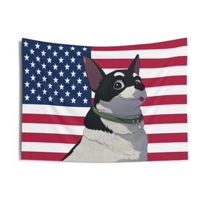 May include: A tapestry featuring a cartoon dog with black and white fur, wearing a green collar, set against the backdrop of the American flag. The dog has a happy expression, with its tongue slightly visible.