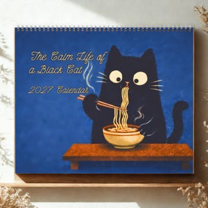 Japanese black cat wall calendar featuring whimsical seasonal illustrations inspired by Japanese culture, perfect for cat lovers and home office decor.