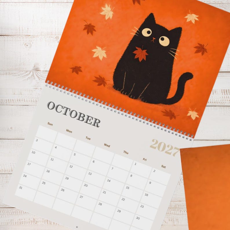 Cute cat calendar 2027 with monthly planning pages and charming black cat artwork, designed for organizing appointments and special events.