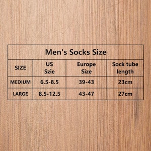 May include: A black grid chart titled Men's Socks Size with columns for Size, US Szie, Europe Size, and Sock tube length. The table lists Medium with US sizes 6.5-8.5, Europe sizes 39-43, and 23cm length, and Large with US 8.5-12.5, Europe 43-47, and 27cm.