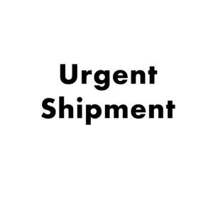 May include: White background with the words "Urgent Shipment" in bold, black font. The text is centered and takes up most of the image.