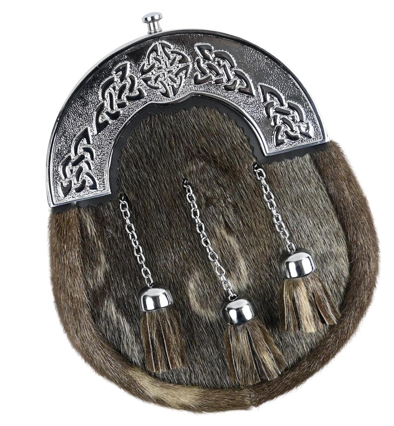 Close-up of brown rabbit fur sporran with intricately engraved chrome Celtic cantle.
