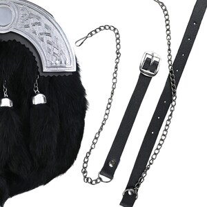 Black rabbit fur sporran with chrome Celtic detail displayed with chain belt and leather strap.