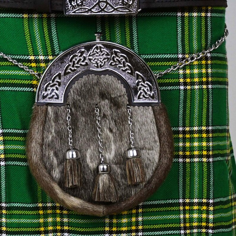 Close-up view of Brown rabbit fur Celtic sporran attached to a tartan kilt."