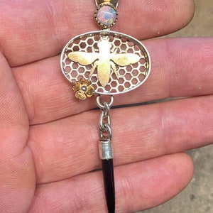 Hand fabricated 14k gold and sterling pendant w lightning ridge opal and black onyx