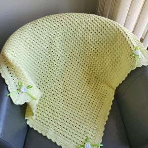 Crocheted Yellow Baby Blanket with White Roses