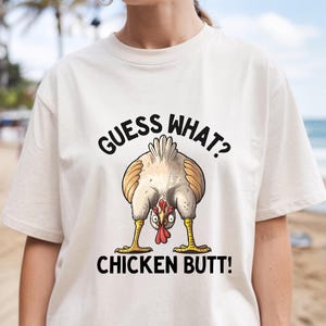 Guess What? Chicken Butt! Funny Png – Hilarious Chicken Humor Png for Adults and Kids. Perfect for Laughter & Casual Wear!